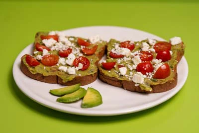 Photo of Slice of Guacamole Feta Cheese Toast