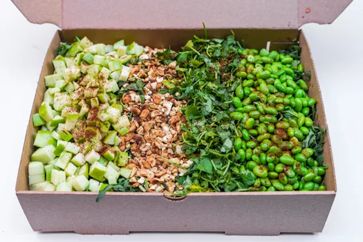 Photo of Tray of Arugula & Apple Salad