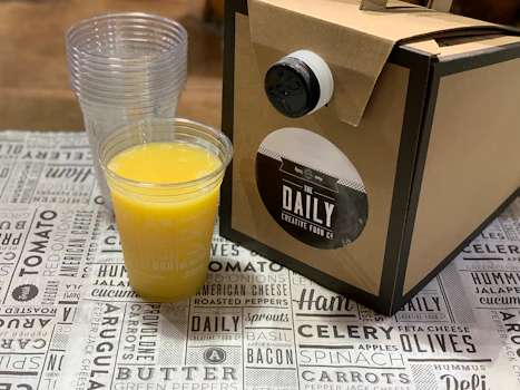 Photo of Carrier of Fresh Orange Juice