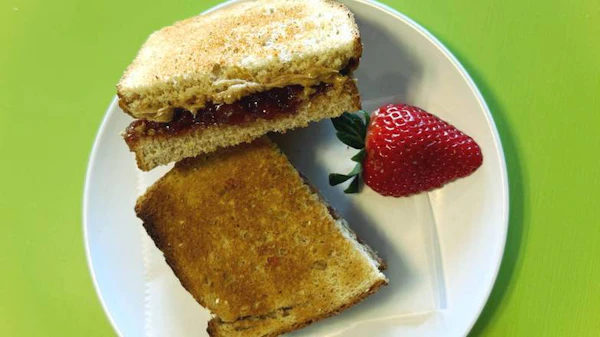 Photo of Peanut Butter and Strawberry Jam Sandwich