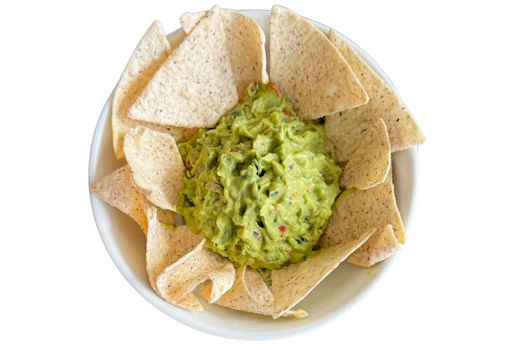 Photo of Tortilla Chips and Homemade Guacamole