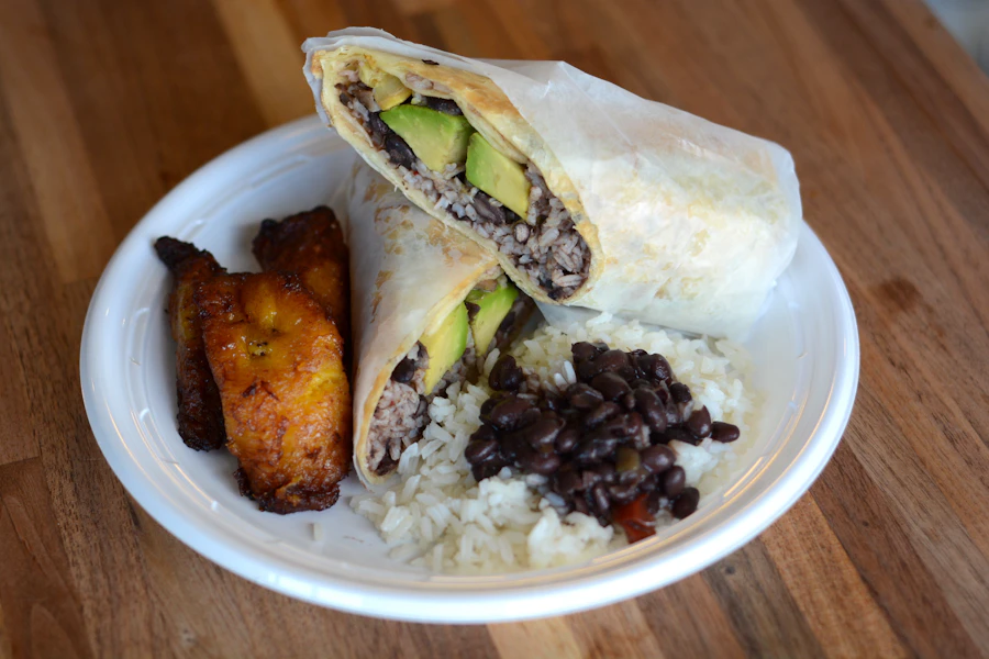 Casa Cubana Corporate Catering and Group Ordering located at 1007 Summit Ave, Jersey City, NJ 07307, USA. Casa Cubana's top menu items include Serving of Plantain Chips and Guacamole, Serving of House Salad, Serving of Churros.