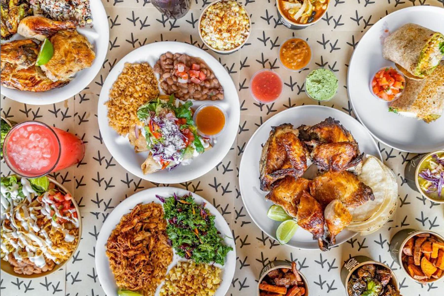 WILDBIRD Corporate Catering and Group Ordering located at 6374 Sunset Blvd, Los Angeles, CA 90028, USA. WILDBIRD's top menu items include Chicken Tinga Market Plate, Boneless Breast Market Plate, Tacos Dorados.