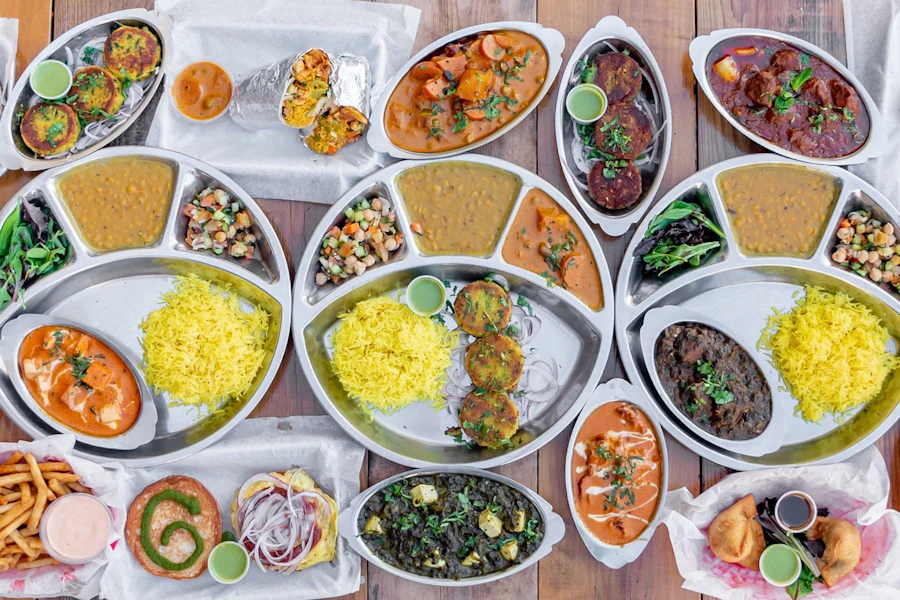 Zareens Corporate Catering and Group Ordering located at 365 California Ave, Palo Alto, CA 94306, USA. Zareens's top menu items include Regular Fresh Baked Naan, Small Tray of Fragrant Cumin Basmati, Large Tray of Grilled Chicken Boti.