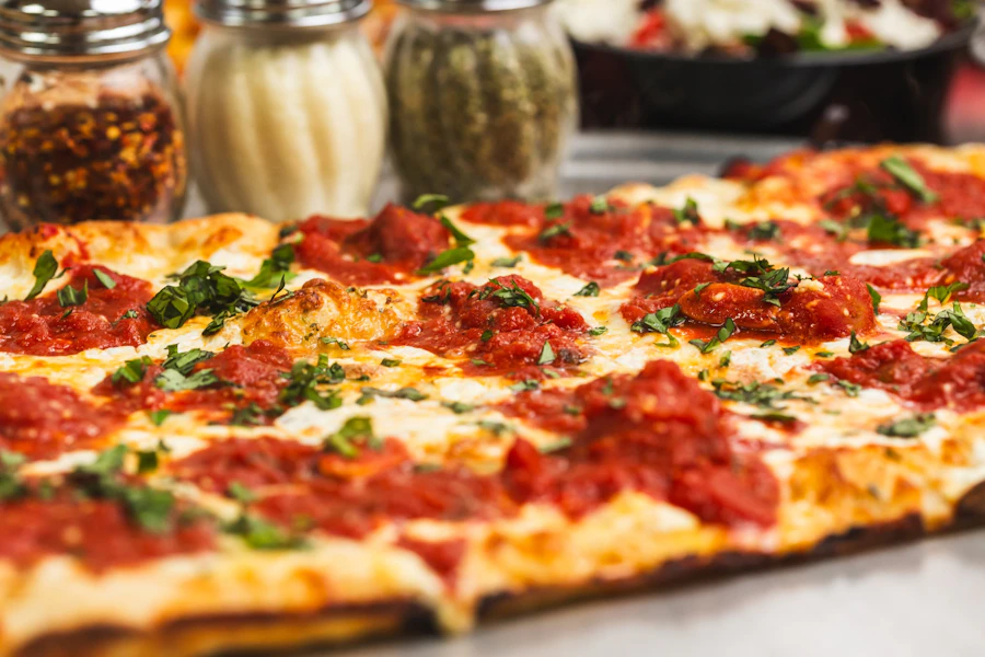 Nonna's Pizzeria & Italian Kitchen Corporate Catering and Group Ordering located at 253 Nassau Ave, Brooklyn, NY 11222, USA. Nonna's Pizzeria & Italian Kitchen 's top menu items include Nonna's Pizza, 3 Feet Hero, Half Tray of Chicken Parmigiana.