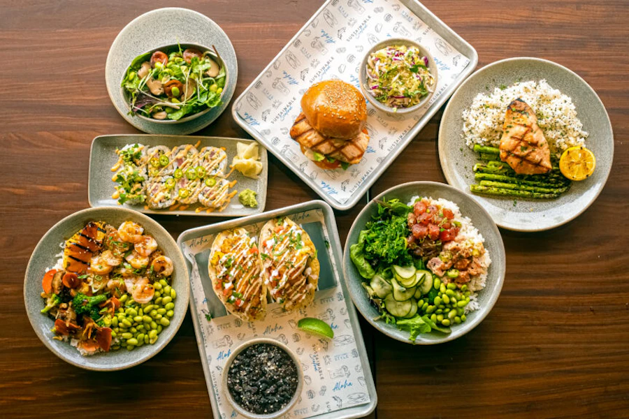 Pacific Catch Corporate Catering and Group Ordering located at 1200 9th Ave, San Francisco, CA 94122, USA. Pacific Catch's top menu items include Lunch-Size Hawaiian Teriyaki Chicken Bowl, Lunch-Size West Coast-Style Grilled Salmon Bowl, Wagyu Cheeseburger.