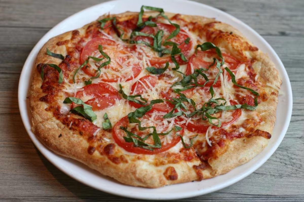 Domani Pizzeria and Restaurant Corporate Catering and Group Ordering located at 1515 Queen Anne Ave N, Seattle, WA 98109, USA. Domani Pizzeria and Restaurant's top menu items include Order of Garlic Bread, Chicken Parmesan Sandwich, 15" Pepperoni Pizza.