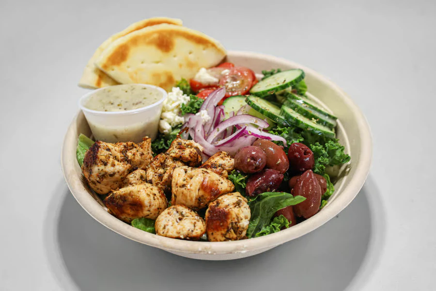 Nik's Greek Corporate Catering and Group Ordering located at 23 N 900 W, Salt Lake City, UT 84116, USA. Nik's Greek's top menu items include Double Chicken Souvlaki Plate, Double Pork Souvlaki Plate, Edamame Falafel Souvlaki Plate.