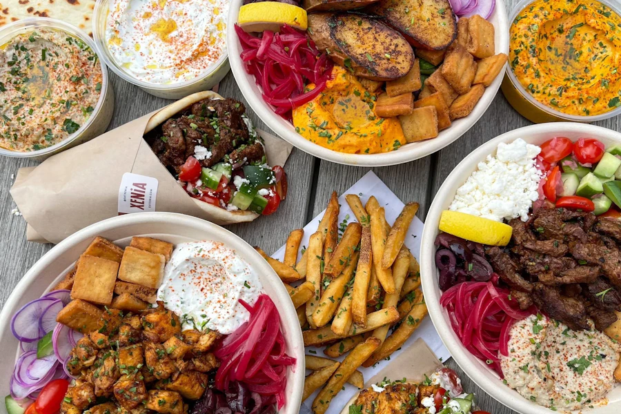 Xenia Corporate Catering and Group Ordering located at 4131 N Rockwell St, Chicago, IL 60618, USA. Xenia's top menu items include Chicken Avocado Bowl, Hot Honey Chicken Bowl, Souvlaki Chicken Rice Bowl.