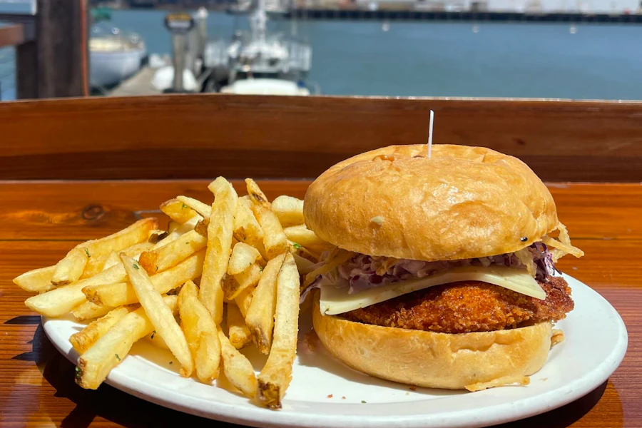 The Ramp Corporate Catering and Group Ordering located at 855 Terry A Francois Blvd, San Francisco, CA 94158, USA. The Ramp's top menu items include Fried Chicken Sando Boxed Lunch, Turkey Sandwich Boxed Lunch, Chicken Bowl.