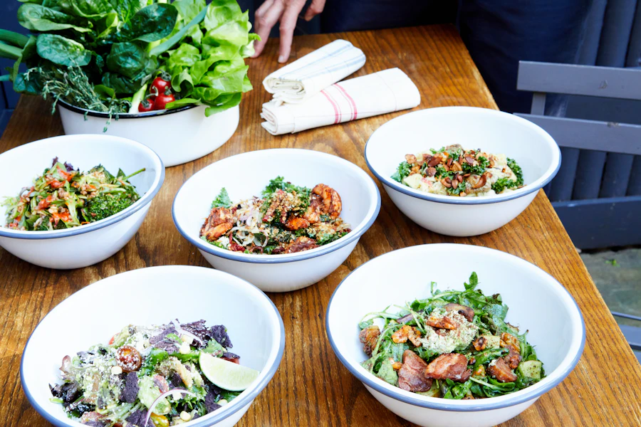 Maison May Kitchen Corporate Catering and Group Ordering located at 246 DeKalb Ave, Brooklyn, NY 11205, USA. Maison May Kitchen's top menu items include Ranch Salmon Bowl, Golden Harvest Bowl, Green Goddess Elote Bowl.