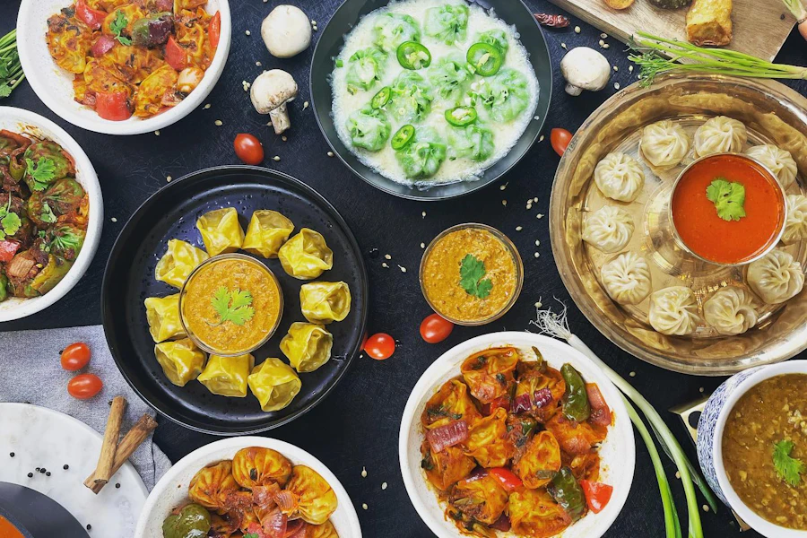 Momo Dumplings Corporate Catering and Group Ordering located at 14200 E Alameda Ave #2c, Aurora, CO 80012, USA. Momo Dumplings's top menu items include Fried Momo Boxed Lunch, Chili Momo Boxed Lunch, Momo Tikka Masala Boxed Lunch.