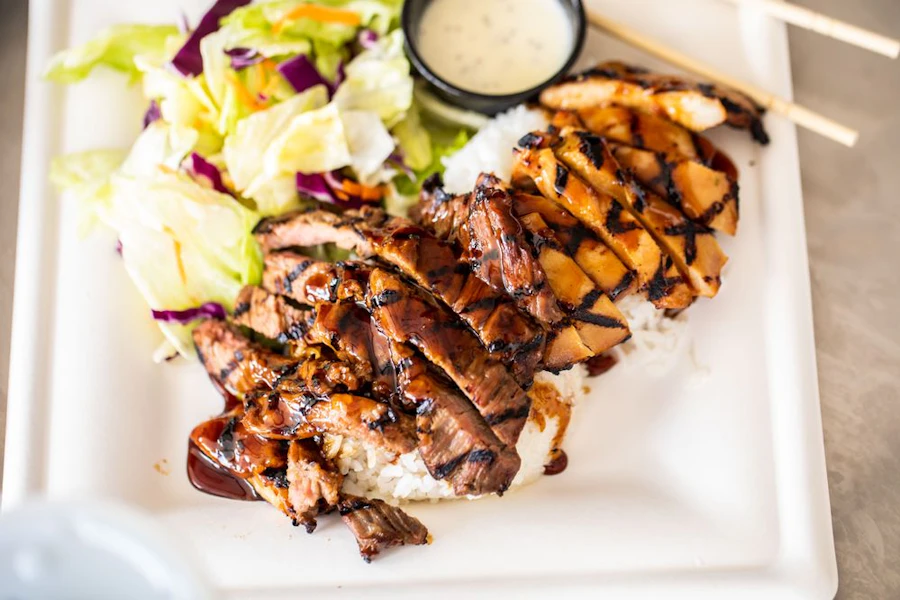 Teriyaki Tom's Corporate Catering and Group Ordering located at Buttercup Creek Trail, Cedar Park, TX 78613, USA. Teriyaki Tom's's top menu items include Order of Cinnamon Cheesecake Rangoons, Regular Chicken Teriyaki Tray, Spicy Steak Teriyaki Tray.