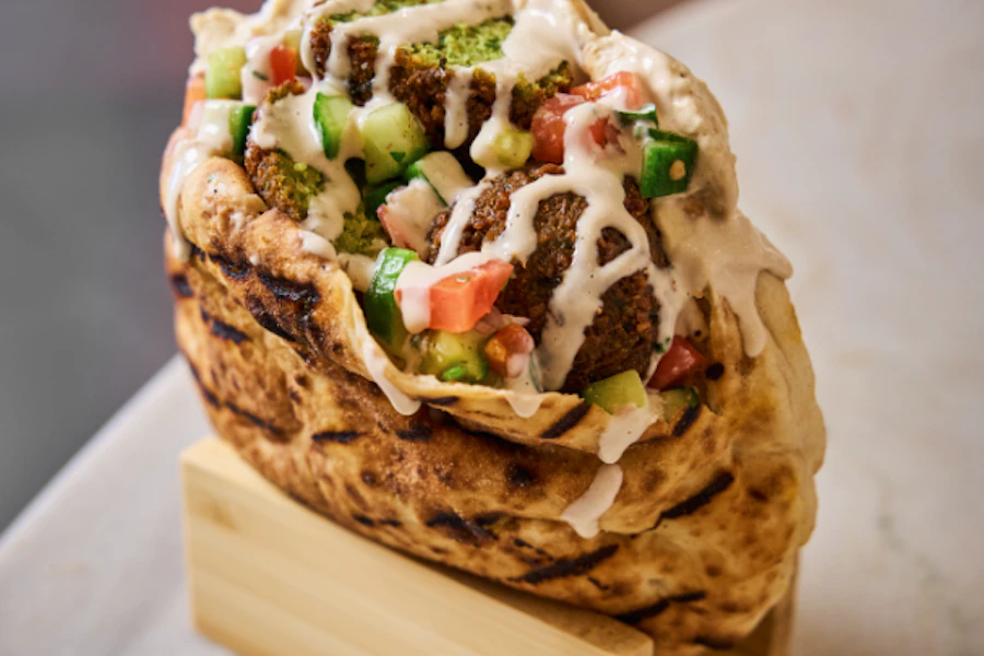Basta Grill Corporate Catering and Group Ordering located at 417 W 47th St, New York, NY 10036, USA. Basta Grill's top menu items include Tray of Chicken Thigh Skewers, Tray of Kofta Beef, Large Order of Falafel.