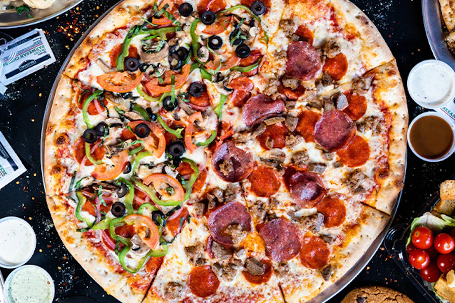 Hoboken Pie Corporate Catering and Group Ordering located at 718 Red River St, Austin, TX 78701, USA. Hoboken Pie's top menu items include 14" Cheese Pizza Pie, Sticky Cinnamon Sugar Knots, 20" Sausage & Peppers Pizza Pie.