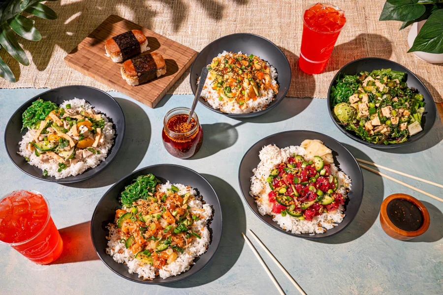 Pokeworks Corporate Catering and Group Ordering located at 5960 Sunset Blvd, Los Angeles, CA 90028, USA. Pokeworks's top menu items include Regular Spicy Ahi Bowl Combo, Regular Luxe Lobster Bowl Combo, Regular Sweet Sesame Chicken Bowl Combo.