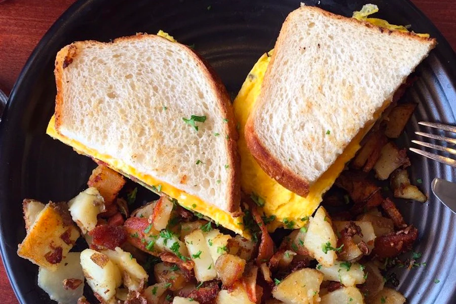 The New Spot On Polk Corporate Catering and Group Ordering located at 2 Townsend St, San Francisco, CA 94107, USA. The New Spot On Polk's top menu items include Order of Regular French Fries, Order of Fresh Fruit, Serving of Bacon.