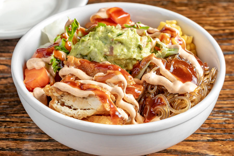 Mad For Chicken Corporate Catering and Group Ordering located at 39-02 Bell Blvd, Bayside, NY 11361, USA. Mad For Chicken's top menu items include Tray of Soy Garlic Bone-in Wings, Tray of Soy Garlic Tenders, Family Size Order of Kimchi Fries.