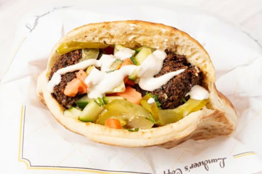 Cafe Landwer - L.A. Corporate Catering and Group Ordering located at 10250 Santa Monica Blvd, Los Angeles, CA 90067, USA. Cafe Landwer - L.A.'s top menu items include Pita Tray, Chicken Fatoush Salad, Chicken & Pesto Pasta.